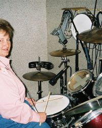 Regina playing drums on recording